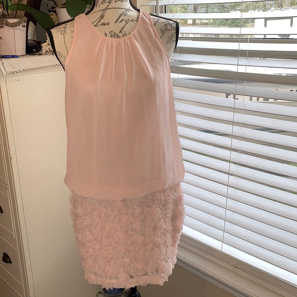 Beautiful mini dress sleeveless, pink pastel, size 6. In perfect condition.